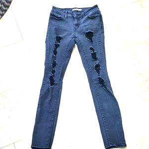 Levi's women's 711 skinny distressed black jeans.